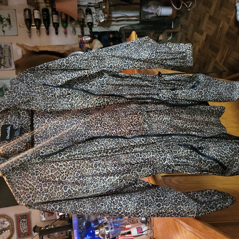 Ladies raincoat...  medium...  animal print